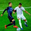 Montreal Impact attacker Maximiliano Urruti, left, and Inter Miami defender Nicolas Figal, right, fight for the ball during an MLS soccer match Saturday, Oct. 17, 2020, in Harrison, N.J. (AP Photo/Eduardo Munoz Alvarez)