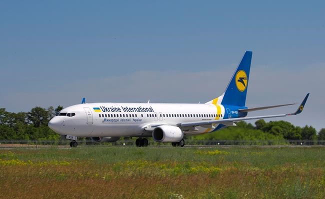 In this photo taken on Saturday, May 26, 2018, showing the actual Ukrainian Boeing 737-800 UR-PSR plane that crashed Wednesday Jan. 8, 2020, on the outskirts of Tehran, Iran, seen here as it waits to takeoff at Borispil international airport outside Kyiv, Ukraine. This Ukrainian airplane carrying 176 people crashed on Wednesday shortly after takeoff from Tehran's main airport, killing all onboard, Iranian state TV and officials in Ukraine said. (AP Photo/Oleg Belyakov)