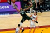 Milwaukee Bucks forward Giannis Antetokounmpo (34) goes to the basket past Miami Heat forward Kelly Olynyk, right, during the second half of an NBA basketball game Wednesday, Dec. 30, 2020, in Miami. (AP Photo/Lynne Sladky)