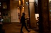 A waiter wearing face mask protect against coronavirus attends to customers in a bar, in Pamplona, northern Spain, Tuesday, June 16, 2020. (AP Photo/Alvaro Barrientos)