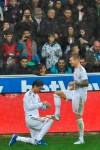 Real Madrid's RSergio Ramos celebrates his goal with teammate Toni Kroos after scoring during the Spanish La Liga soccer match between Real Madrid and Alaves at Mendizorroza stadium, in Vitoria, northern Spain, Saturday, Nov. 30, 2019. (AP Photo/Alvaro Barrientos)