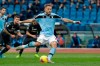 Lazio's Ciro Immobile scores his side's second goal on a penalty shot during a Serie A soccer match between Lazio and Sampdoria, at Rome's Olympic Stadium, Saturday, Jan. 18, 2020. (AP Photo/Andrew Medichini)