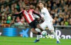 Athletic Bilbao's Inaki Williams, left, and Real Madrid's Sergio Ramos fight for the ball during a Spanish La Liga soccer match between Real Madrid and Athletic Bilbao at the Santiago Bernabeu stadium in Madrid, Spain, Sunday Dec. 22, 2019. (AP Photo/Paul White)