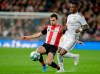 Real Madrid's Vinicius Junior, front, is tackled by Athletic Bilbao's Inigo Lekue during a Spanish La Liga soccer match between Real Madrid and Athletic Bilbao at the Santiago Bernabeu stadium in Madrid, Spain, Sunday Dec. 22, 2019. (AP Photo/Paul White)