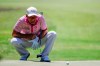 Alex Cejka, of Germany, lines up his putt on the sixth hole during the final round of the Regions Tradition Champions Tour golf tournament Sunday, May 9, 2021, in Hoover, Ala. (AP Photo/Butch Dill)