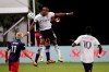 Philadelphia Union forward Sergio Santos (17) goes up for a header against New England Revolution defender Andrew Farrell during the first half of an MLS soccer match, Saturday, July 25, 2020, in Kissimmee, Fla. (AP Photo/John Raoux)