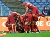 Roma's Gianluca Mancini is celebrated by teammates after he scored his side's second goal during a Serie A soccer match between Roma and Inter Milan at Rome's Olympic stadium, Sunday, Jan. 10, 2021. (AP Photo/Gregorio Borgia)