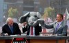 FILE - In this Oct. 22, 2016, file photo, ESPN's Lee Corso wears Big Al's mascot head after picking Alabama to win over Texas A&M as Vern Lundquist, left, and Kirk Herbstreit laugh on the set of ESPN's College GameDay outside Bryant-Denny Stadium in Tuscaloosa, Ala. The Par 3 Contest is out at the spectator-free Masters in November. ESPN's “College GameDay” is in. Augusta National announced Tuesday, Oct. 27, 2020, more changes to a Masters tournament that will be unlike any of the previous 83. The most unusual of all is ESPN's popular college football pregame show taking place on a stage that overlooks Ike's Pond and the ninth green of the Par 3 course. (Erin Nelson/The Tuscaloosa News via AP, File)