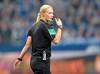 FILE - In this Oct. 20, 2017 file photo, female referee Bibiana Steinhaus blows the whistle during the German Bundesliga soccer match between FC Schalke 04 and FSV Mainz 05 at the Arena in Gelsenkirchen, Germany. Steinhaus, one of the most decorated referees in women's soccer and the first female referee in the German men's Bundesliga, announced her retirement Wednesday, Sept. 30, 2020. Steinhaus will oversee Wednesday's German Super Cup game between Bayern Munich and Borussia Dortmund as her last fixture. The 41-year-old police officer said her decision followed a period of reflection and that she would give more detail about her motivations later. (AP Photo/Martin Meissner, file)