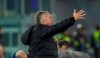 FILE - In this Thursday, Nov. 28, 2019 file photo CFR's manager Dan Petrescu gives directions to his players during the Europa League soccer match between Lazio and CFR Cluj at Rome's Olympic stadium. In the Europe-wide race to finish this soccer season before the next one starts, Romania’s league aims to beat a UEFA target for completion by resuming in two weeks' time. On Thursday, May 28, 2020, public authorities were agreeing protocols to keep players and officials safe for a June 13 restart in Liga 1. (AP Photo/Alessandra Tarantino, File)