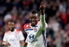 FILE - In this Sunday, March 3, 2019 file photo, Lyon forward Bertrand Traore celebrates after scoring his side's fifth goal during the French League One soccer match between Lyon and Toulouse, in Decines, near Lyon, central France. Aston Villa has signed Burkina Faso forward Bertrand Traore from French top-flight club Lyon subject to international clearance. No fee was disclosed but media reports on Saturday, Sept. 19, 2020 put it at around 17 million pounds. (AP Photo/Laurent Cipriani, File)