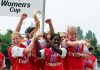 FILE - In this Sunday, April 29, 2007 file photo, Arsenal Ladies celebrate with the trophy after beating Umea IK 1-0 on aggregate during their Women's Cup final second leg soccer match at the Meadow Park stadium, London. For Arsenal, this year’s Women’s Champions League win-or-go-home tournament is more like win or stay home because the truncated English season has left the team out next season’s competition. The seven other teams in the knockout tournament scheduled to begin Friday, Aug. 21, 2020 in Spain’s northern Basque Country have already qualified for next season's Champions League. Arsenal needs to win it to get back into it. (AP Photo/Tom Hevezi, File)