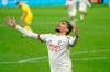 FILE - In this Wednesday, Dec. 23, 2020 file photo, Lyon's Lucas Paqueta celebrates after scoring his sides's third goal during the French League One soccer match between Lyon and Nantes, in Decines, near Lyon, central France. When the best player in Lyon's history phoned AC Milan's greatest defender they talked business. Juninho persuaded Paolo Maldini, Milan's technical director and his former Champions League adversary to sell midfielder Lucas Paqueta to Lyon for 20 million euros ($24.5 million). It has proved the signing of the French season, with Paqueta the driving force in a Lyon side three points clear at the top and heading into Saturday's trip to Rennes unbeaten in 15 games. (AP Photo/Laurent Cipriani, File)
