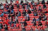 FILE - In this Saturday, Aug. 29, 2020 file photo, soccer fans watch the match during the League One soccer match between Rennes and Montpellier, at the Roazhon Park stadium in Rennes, France. The French soccer league has praised a decision to allow 7,000 fans in the stadium for a second division match between Auxerre and Clermont next weekend. Because of coronavirus restrictions, a maximum of 5,000 spectators are allowed at games, unless clubs get a special dispensation from their local authority. (AP Photo/David Vincent, File)