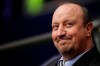 FILE - In this Saturday, Feb. 2, 2019 file photo, Newcastle coach Rafael Benitez smiles prior to the start of the English Premier League soccer match between Tottenham Hotspur and Newcastle at Wembley Stadium in London. Benitez has left Chinese club Dalian Pro citing family reasons during the coronavirus pandemic. Benitez says “supporting our families has been a priority when making this decision.” Benitez had one year left on his contract with Dalian which finished 12th in the 16-team Chinese Super League last season. (AP Photo/Tim Ireland, File)