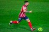 FILE - In this Saturday, Dec. 12, 2020 file photo, Atletico Madrid's Kieran Trippier runs with the ball during the Spanish La Liga soccer match between Real Madrid and Atletico Madrid at the Alfredo Di Stefano stadium in Madrid, Spain. England and Atletico Madrid defender Kieran Trippier has been banned from football for 10 weeks and fined $94,000 for breaching betting rules in a punishment from The English Football Association that applies worldwide. The misconduct denied by Trippier happened in July 2019 ‚Äî the month he left Tottenham for Atletico. The FA said an independent regulatory commission proved four of the breaches but dismissed three allegations during a personal hearing. (AP Photo/Bernat Armangue, File)