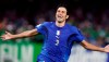 FILE - In this Sunday, July 9, 2006 file photo, Italy 's Fabio Grosso reacts after scoring the winning goal in a penalty shootout against France in the final of the soccer World Cup between Italy and France in the Olympic Stadium in Berlin. Former World Cup winner Fabio Grosso has been hired to coach Swiss club Sion for one season. The 42-year-old Italian moves to Switzerland after coaching three clubs in his home country. (AP Photo/Luca Bruno, File)
