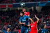 FILE - In this Tuesday, Dec. 10, 2019 file photo, Benfica's Carlos Vinicius, top, out jumps Zenit's Aleksei Sutormin, front, to clear the ball during the Champions League group G soccer match between Benfica and Zenit St. Petersburg at the Luz stadium in Lisbon. Tottenham ended its search for a new striker with Carlos Vinicius joining the Premier League club on loan from Benfica. The 25-year-old Brazilian, who was joint top goalscorer in Portugal’s Primeira Liga last season with 18 goals in 32 matches, will stay with the north London club for the full campaign. Spurs will pay a loan fee of three million euros ($3.5 million) with the option of buying Vinicius for 45 million euros ($53 million) permanently at the end of the season. (AP Photo/Armando Franca, File)