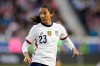 FILE - In this March 8, 2020, file photo, United States forward Christen Press looks for a pass during the second half of a SheBelieves Cup soccer match against Spain, in Harrison, N.J. Press says she wants to honor Kobe Bryant by playing for Manchester United wearing a No. 24 jersey. The American's usual No. 23 was already taken when she signed for a season with the English club earlier in September, 2020. (AP Photo/Steve Luciano, File)