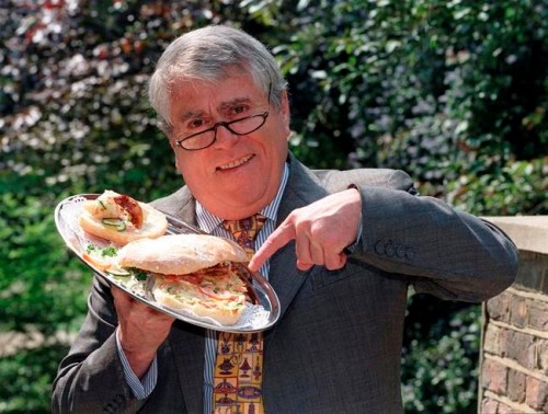 FILE - In this May 16, 1997 file photo, Albert Roux poses for a photo. Roux, the French-born chef and restaurateur who along with his late brother Michel had a profound influence on British dining habits, has died. He was 85, it was reported on Wednesday, Jan. 6, 2021. The brothers are widely credited with revolutionizing Britain’s staid and old-fashioned culinary scene, notably with their opening of Le Gavroche in London in 1967, a restaurant that was frequented by a loyal clientele that included many of the icons of the Swinging Sixties in London. (PA via AP, File)