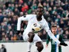 FILE - In this Thursday, Nov. 28, 2019 file photo, Tokmac Nguen of Ferencvaros in action during the soccer Europa League Group H fifth round soccer match Ferencvaros vs. Espanyol at the Groupama Arena in Budapest, Hungary. The Hungarian soccer federation has issued a written reprimand to a player of African origin who showed his undershirt with the words “Justice for George Floyd” after scoring a goal. Tokmac Nguen was born in a refugee camp in Kenya to parents from South Sudan and grew up in Norway. He scored for Ferencvaros in its 1-1 draw with Puskas Akademia on Sunday, May 31, 2020. (Zsolt Szigetvary/MTI via AP, File)