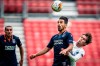 Istanbul Basaksehir's Irfan Can Kahveci, foreground and FC Copenhagen's Robert Mudrazija vie for the ball, during the Europa League round of 16 second leg soccer match between FC Copenhagen and Istanbul Basaksehir, at Telia Parken in Copenhagen, Wednesday, Aug. 5, 2020. (Mads Claus Rasmussen/Ritzau Scanpix via AP)