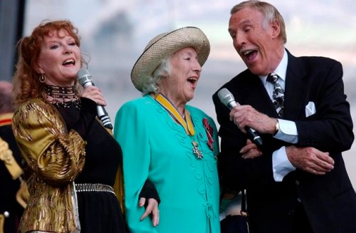 Edmond Terakopian / PA / The Associated Press Files
FILE - In this July, 10, 2005 file photo, Dame Vera Lynn, centre, singer Petula Clark, left and entertainer Bruce Forsyth sing 