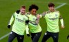 From left, Manchester City's Kevin De Bruyne, left, Leroy Sane and John Stones take part in a training session at the City Football Academy, in Manchester, England, Tuesday, Feb. 25, 2020. Manchester United will play Real Madrid in a Champions League soccer match on Wednesday. (Martin Rickett/PA via AP)