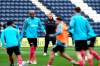 FILE - In this Tuesday, April 20, 2021 file photo, Derby County manager Wayne Rooney, centre back, watches his players warm up on the pitch ahead of their Championship soccer match against Preston at Deepdale Stadium, Preston, England. Rooney the player found ways to score. Wayne Rooney the manager has hit a wall. The Manchester United great finds himself in a relegation battle in England’s second division as Derby's losses pile up. The club that Rooney took over first on an interim basis as player-coach and then permanently in January upon his retirement has just one win from its past 13 games. (Martin Rickett/PA via AP, File)