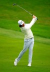 England's Tommy Fleetwood takes a shot, during day three of thePGA Championship at Wentworth Club, in Virginia Water, Surrey, England, Saturday, Oct. 10, 2020. (Adam Davy/PA via AP)