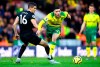 Wolverhampton Wanderers' Conor Coady, left and Norwich City's Emi Buendia battle for the ball during the English Premier League soccer match between Norwich and Wolverhampton Wanderers, at Carrow Road, in Norwich, England, Saturday Dec. 21, 2019. (Joe Giddens/PA via AP)