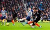 Chelsea's Christian Pulisic, right, shoots wide, during the English Premier League soccer match between Brighton and Chelsea at the AMEX Stadium, Brighton, England, Wednesday Jan. 1, 2020. (Gareth Fuller/PA via AP)