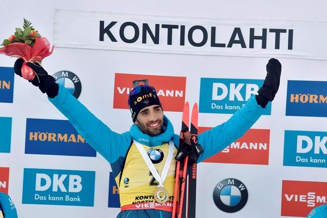 Martin Fourcade of France celebrates victory in his final competition, after winning the men's 12.5 km Pursuit competition at the IBU Biathlon World Cup in Kontiolahti, Finland, Saturday March 14, 2020. Fourcade retired from the sport on Saturday exactly ten years after his first World Cup victory in Kontiolahti. (Jussi Nukari/Lehtikuva via AP)