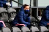 Tottenham Hotspur's Alex Morgan sit in the stands during the FA Women's Super League soccer match between Tottenham Hotspur and Manchester United, at the Hive, in London, Saturday, Oct. 10, 2020. (Kirsty O'Connor/PA via AP)