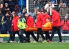Aston Villa goalkeeper Tom Heaton, centre, is carried off the pitch on a stretcher, during the English Premier League soccer match between Burnley and Aston Villa, at Turf Moor, Burnley, England, Wednesday Jan. 1, 2020. (Anthony Devlin/PA via AP)