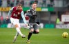 Burnley's Jay Rodriguez, left has a shot on goal , during the English Premier League soccer match between Burnley and Leicester City at Turf Moor, in Burnley, England, Sunday, Jan. 19, 2020. (Nick Potts/PA via AP)