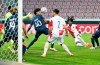 Slavia Prague's Peter Olayinka, righ, scores in the Champions League play off qualifier soccer match between FC Midtjylland and Slavia Prague at MCH Arena in Herning, Wednesday, Sept. 30 2020. (Henning Bagger/Ritzau Scanpix via AP)