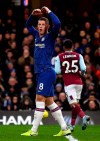 Chelsea's Ross Barkley rues a missed chance, during the English Premier League soccer match between Chelsea and Burnley at Stamford Bridge, in London, Saturday, Jan. 11, 2020. (Victoria Jones/PA via AP)