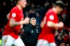 Manchester United manager Ole Gunnar Solskjaer, centre, watches the action from the touchline, during the English Premier League soccer match between Manchester United and Burnley, at Old Trafford, in Manchester, England, Wednesday, Jan. 22, 2020. (Martin Rickett/PA via AP)