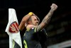 Southampton's Danny Ings celebrates his side's second goal, scored by teammate James Ward-Prowse, obscured, during the English Premier League soccer match between Arsenal and Southampton, at the Emirates Stadium, in London, Saturday, Nov. 23, 2019. (Yui Mok/PA via AP)