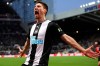 Newcastle United's Federico Fernandez celebrates scoring his side's second goal of the game during the English Premier League soccer match between Newcastle United and Southampton, at St James' Park, in Newcastle, England, Sunday, Dec. 8, 2019. (Owen Humphreys/PA via AP)