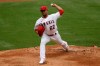 Los Angeles Angels starting pitcher Jose Quintana throws to a Los Angeles Dodgers batter during the first inning of a baseball game in Anaheim, Calif., Sunday, May 9, 2021. (AP Photo/Alex Gallardo)
