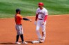 Los Angeles Angels' Shohei Ohtani, right, talks to Houston Astros second baseman Jose Altuve after stealing second during the first inning of a baseball game Tuesday, April 6, 2021, in Anaheim, Calif. (AP Photo/Mark J. Terrill)