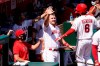 Los Angeles Angels' Anthony Rendon, right, celebrates his two-run home run with Mike Trout, center, during the first inning of a baseball game against the Arizona Diamondbacks, Thursday, Sept. 17, 2020, in Anaheim, Calif. (AP Photo/Marcio Jose Sanchez)