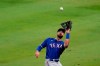 Texas Rangers right fielder Joey Gallo catches a foul ball hit by Los Angeles Angels' Mike Trout during the third inning of a baseball game Friday, Sept. 18, 2020, in Anaheim, Calif. (AP Photo/Ashley Landis)