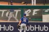Texas Rangers left fielder Eli White watches a home run by Los Angeles Angels' Albert Pujols fall on the other side of the fence during the fifth inning of a baseball game Friday, Sept. 18, 2020, in Anaheim, Calif. (AP Photo/Ashley Landis)