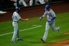 Los Angeles Dodgers' Cody Bellinger, right, celebrates his two-run home run with third base coach Dino Ebel during the sixth inning of a baseball game against the Los Angeles Angels, Friday, Aug. 14, 2020, in Anaheim, Calif. (AP Photo/Jae C. Hong)
