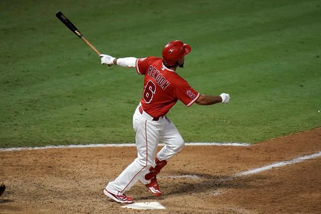 Los Angeles Angels' Anthony Rendon watches his three-run home run against the Houston Astros during the seventh inning of the second baseball game of a doubleheader Saturday, Sept. 5, 2020, in Anaheim, Calif. (AP Photo/Jae C. Hong)