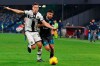 Napoli's Lorenzo Insigne, right, Parma's Matteo Darmian vie for the ball during the Italian Serie A soccer match between Napoli and Parma at the San Paolo stadium in Naples, Italy, Saturday, Dec. 14, 2019. (Ciro Fusco /ANSA via AP)