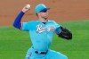 Texas Rangers starting pitcher Corey Kluber throws against the Colorado Rockies in the first inning of a baseball game Sunday, July 26, 2020, in Arlington, Texas. Kluber was removed from the game after one inning. (AP Photo/Louis DeLuca)